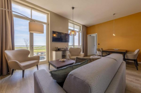 Wellenreiter - 5-Sterne Ferienwohnung mit Südbalkon und Boddenblick in Wustrow